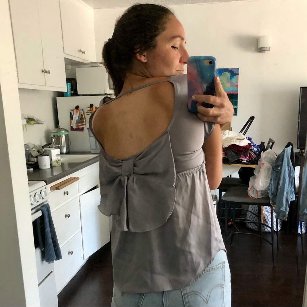 Silver blouse with bow in back